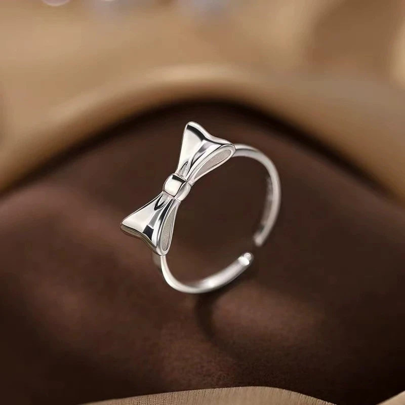 Anello Fiocco Minimal • Argento 925 Placcato Platino • Regolabile